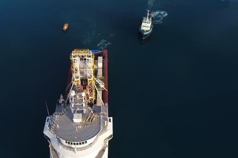 Aerial view of Dina Polaris leaving dock with GMTR120 Offshore Drilling Rig